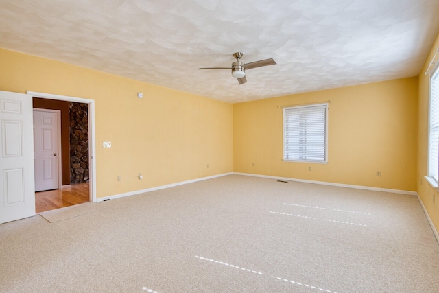 1782 Wolf Creek Rd, Narrows, VA 24124 - carpeted empty room with ceiling fan, baseboards, and a textured ceiling