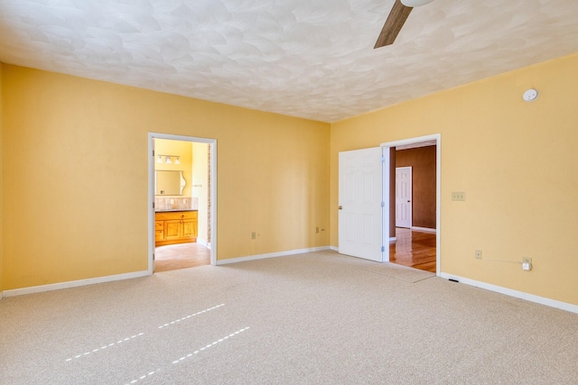 1782 Wolf Creek Rd, Narrows, VA 24124 - spare room featuring light carpet, baseboards, a textured ceiling, ceiling fan, and a smoke detector