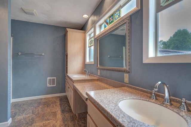 1782 Wolf Creek Rd, Narrows, VA 24124 - full bath featuring vanity, stone finish flooring, and baseboards