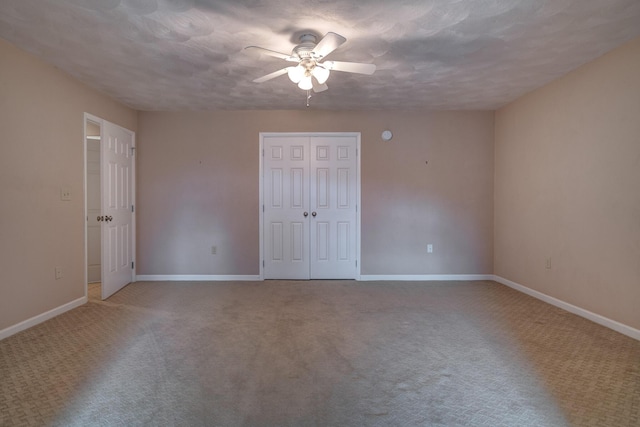 1782 Wolf Creek Rd, Narrows, VA 24124 - unfurnished room with ceiling fan, carpet floors, baseboards, and a textured ceiling