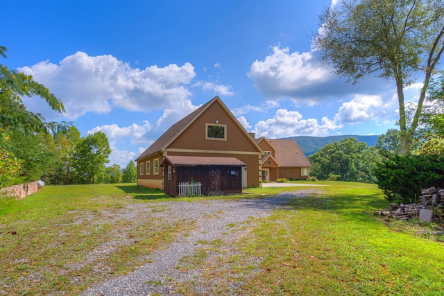 1782 Wolf Creek Rd, Narrows, VA 24124 - view of front of house with a front yard and stucco siding
