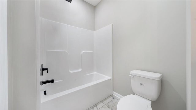 full bathroom with marble finish floor, shower / tub combination, toilet, and baseboards