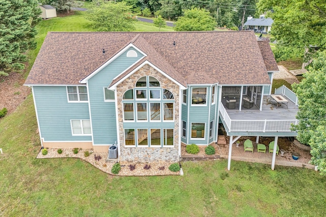 900 Lakemount Dr, Moneta, VA 24121 - rear view of house with a wooden deck, stone siding, a lawn, and a sunroom