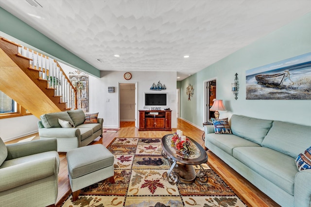 900 Lakemount Dr, Moneta, VA 24121 - living area with light wood-style flooring, recessed lighting, stairway, and baseboards