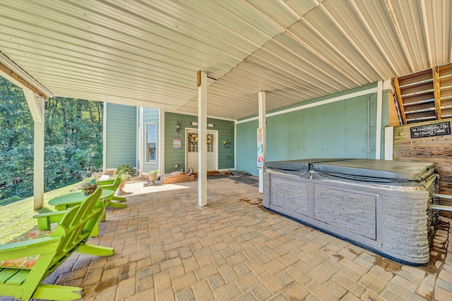 view of patio / terrace featuring a hot tub