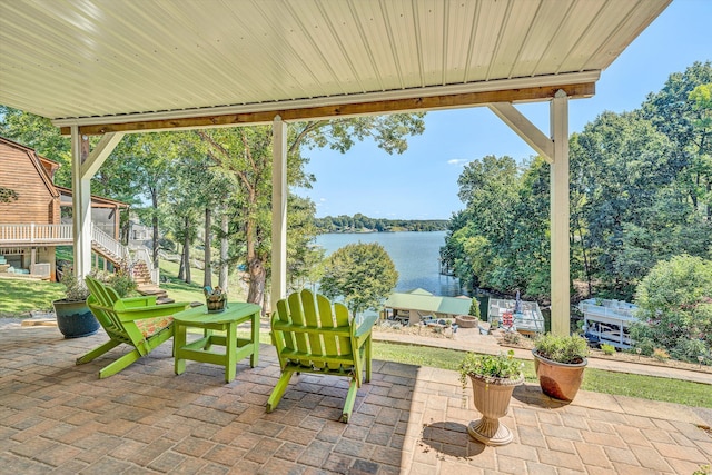 view of patio featuring a water view