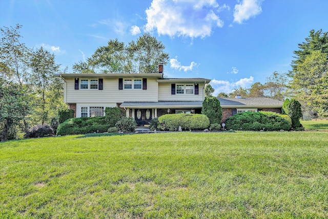 view of property featuring a front yard