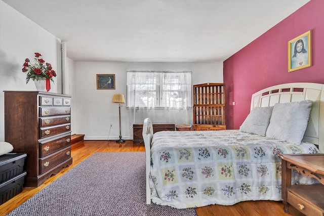 bedroom featuring hardwood / wood-style floors