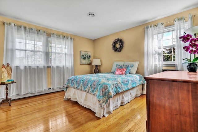 bedroom featuring light wood-type flooring