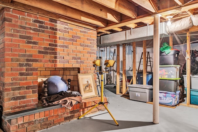 basement with brick wall