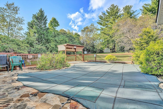 view of swimming pool featuring a patio