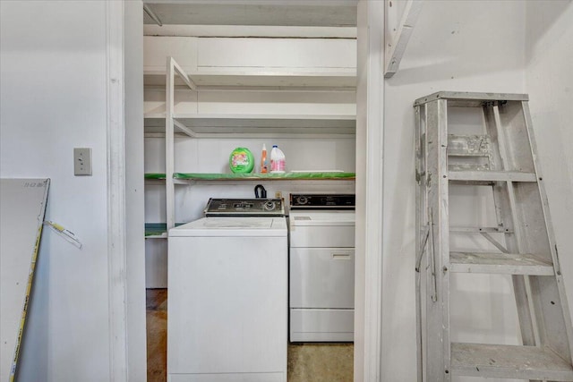 laundry room featuring washing machine and clothes dryer