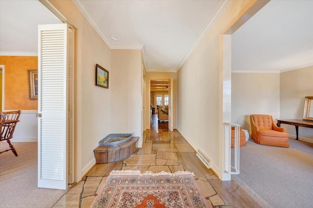 hallway featuring ornamental molding and light carpet