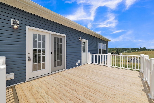 wooden terrace featuring french doors