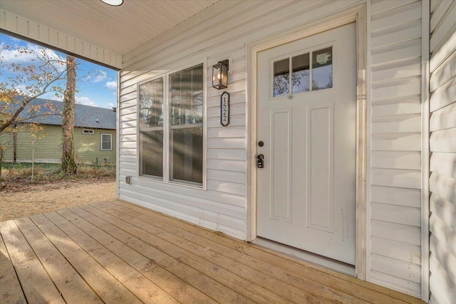 property entrance with a porch