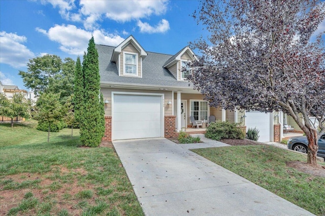 new england style home with a garage and a front lawn