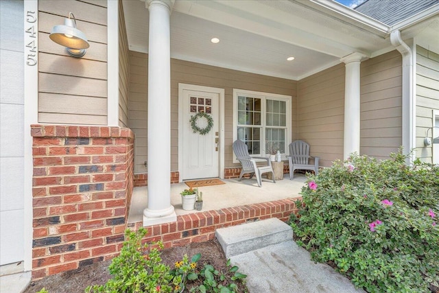 doorway to property with a porch