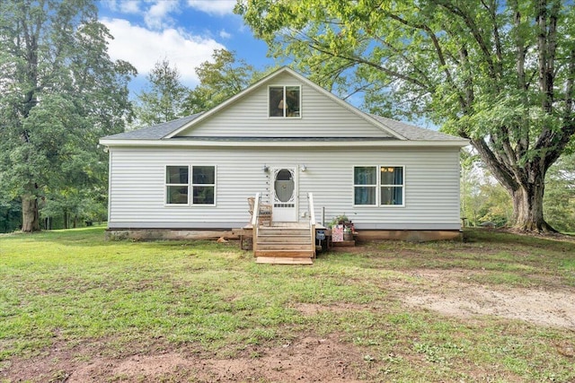 view of front of home with a front lawn