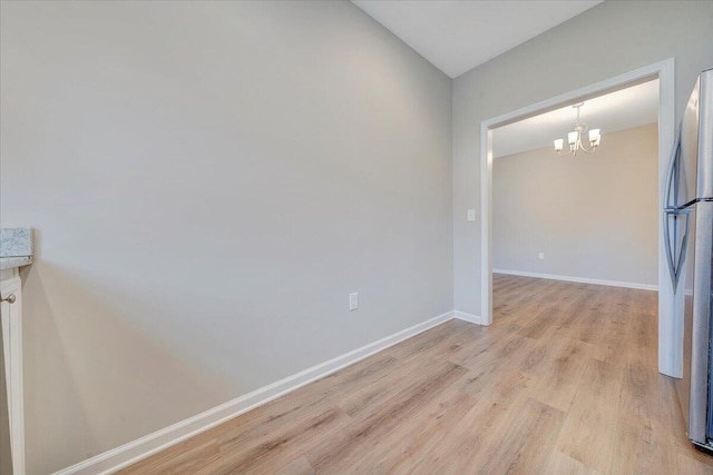 stairway with hardwood / wood-style floors and ceiling fan