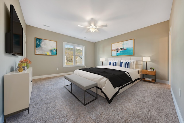 carpeted bedroom with ceiling fan