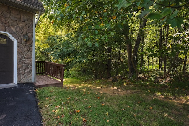 view of yard featuring a deck