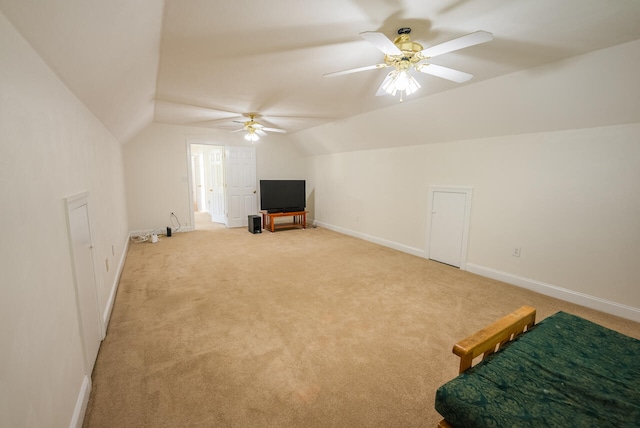 additional living space featuring lofted ceiling, ceiling fan, and carpet floors