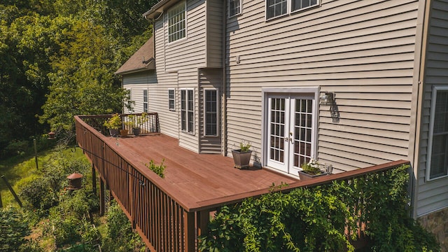 wooden deck featuring french doors