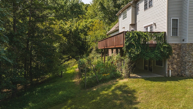 view of yard with a deck