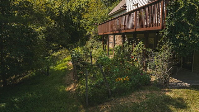 view of yard with a wooden deck