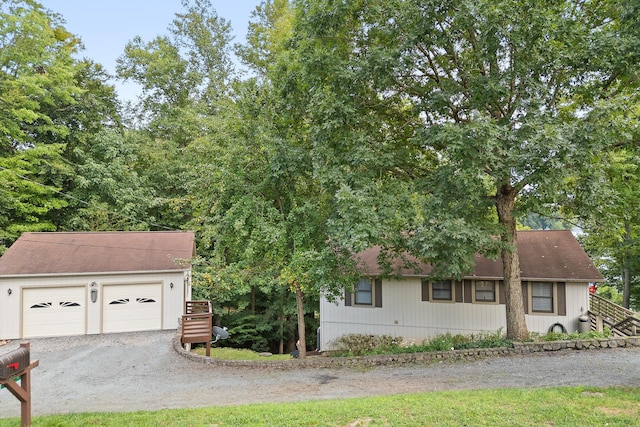 view of front of home with a garage