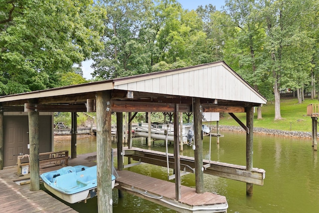 dock area featuring a water view