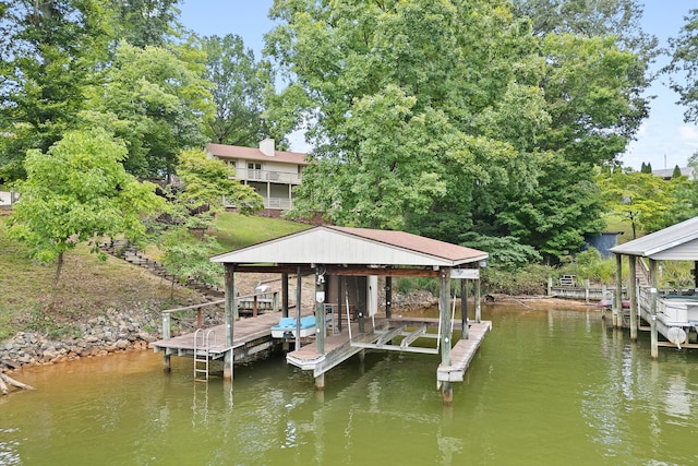 dock area featuring a water view