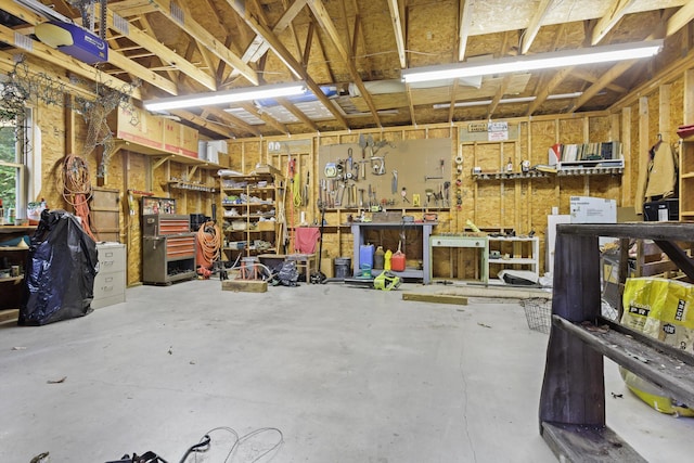 garage featuring a workshop area