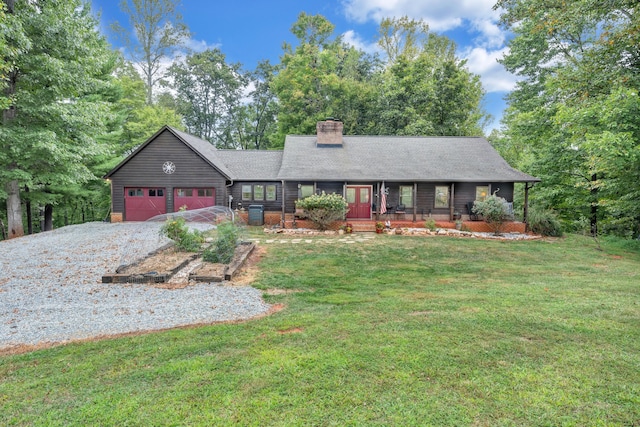 ranch-style home with a front yard, a garage, and a porch