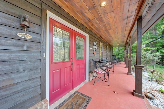 doorway to property with a porch