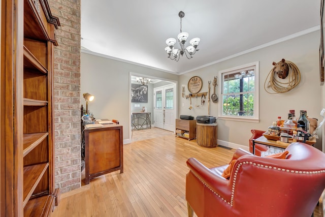 living room with a chandelier, hardwood / wood-style floors, and crown molding