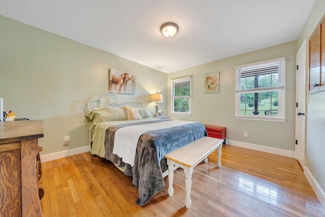 bedroom with light hardwood / wood-style floors