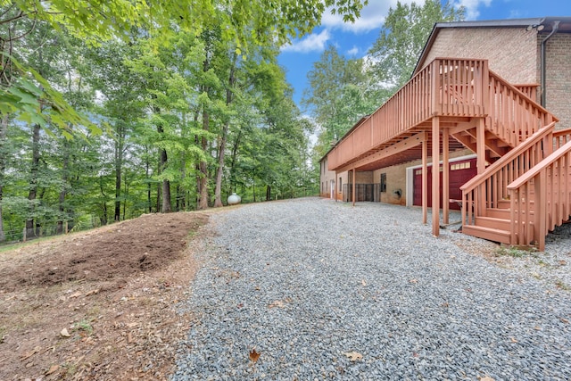 view of side of home with a deck