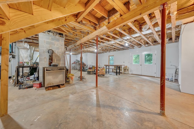 basement featuring a wood stove