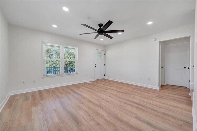 unfurnished room with light hardwood / wood-style flooring and ceiling fan