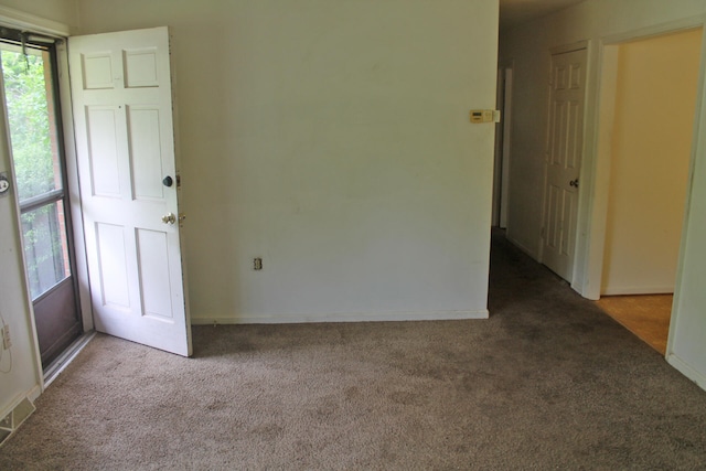 empty room with carpet floors