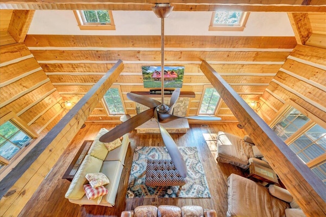 living room with lofted ceiling and hardwood / wood-style floors