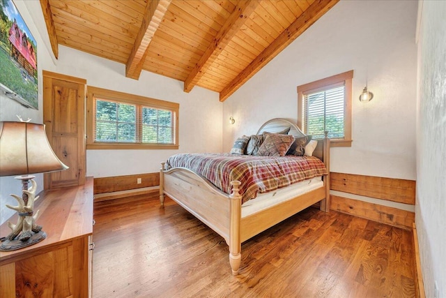 bedroom with wooden ceiling, vaulted ceiling with beams, and hardwood / wood-style flooring