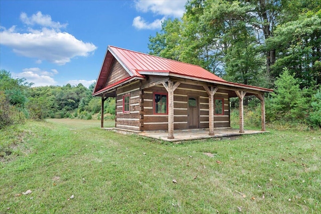 exterior space featuring a yard