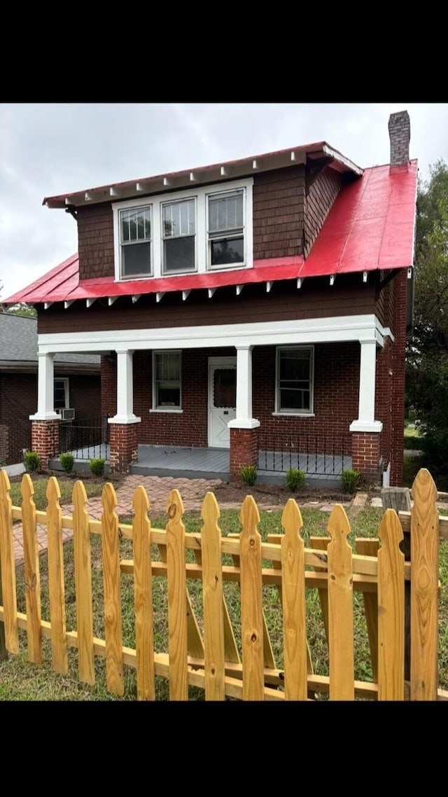 view of front facade featuring covered porch