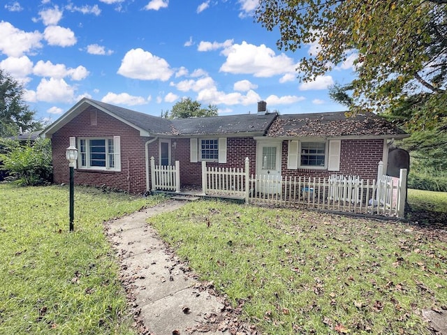 53 Woodberry Ln, Galax, VA 24333 - ranch-style home featuring brick siding, a chimney, a front lawn, and a fenced front yard