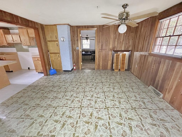 53 Woodberry Ln, Galax, VA 24333 - empty room featuring wood walls, ceiling fan, and visible vents