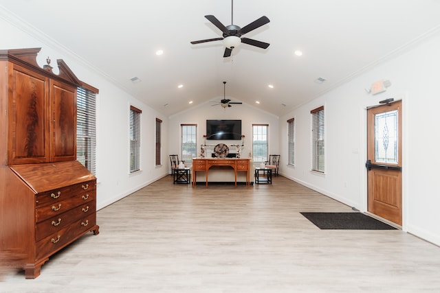 bedroom featuring crown molding, light hardwood / wood-style floors, and lofted ceiling