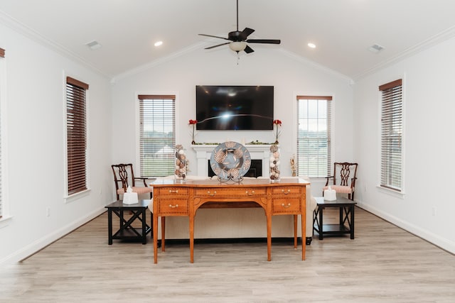 interior space with ornamental molding, ceiling fan, and a healthy amount of sunlight