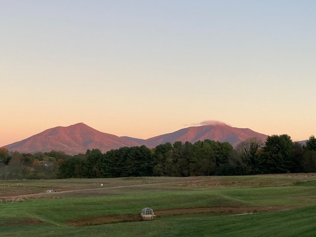 property view of mountains with a rural view